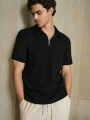 BLACK KNITTED ZIPPER POLO.